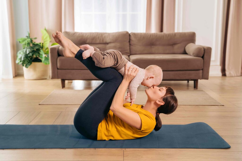Postnatal yoga mom and baby