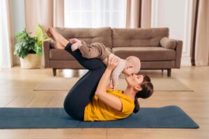 Postnatal yoga mom and baby