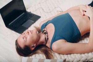 a woman having trouble with insomnia and practice relaxatiion